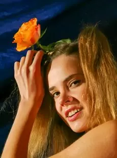 Stunning18 Anais Posing with a Rose