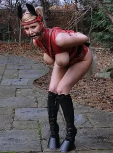 PetAndPonyGirls Ariel Ponygirl in red outdoors   62 images